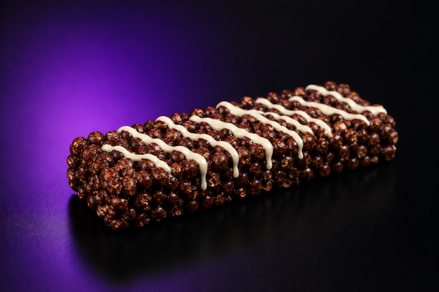 Close-up of the unwrapped INFINITREATS chocolate bar